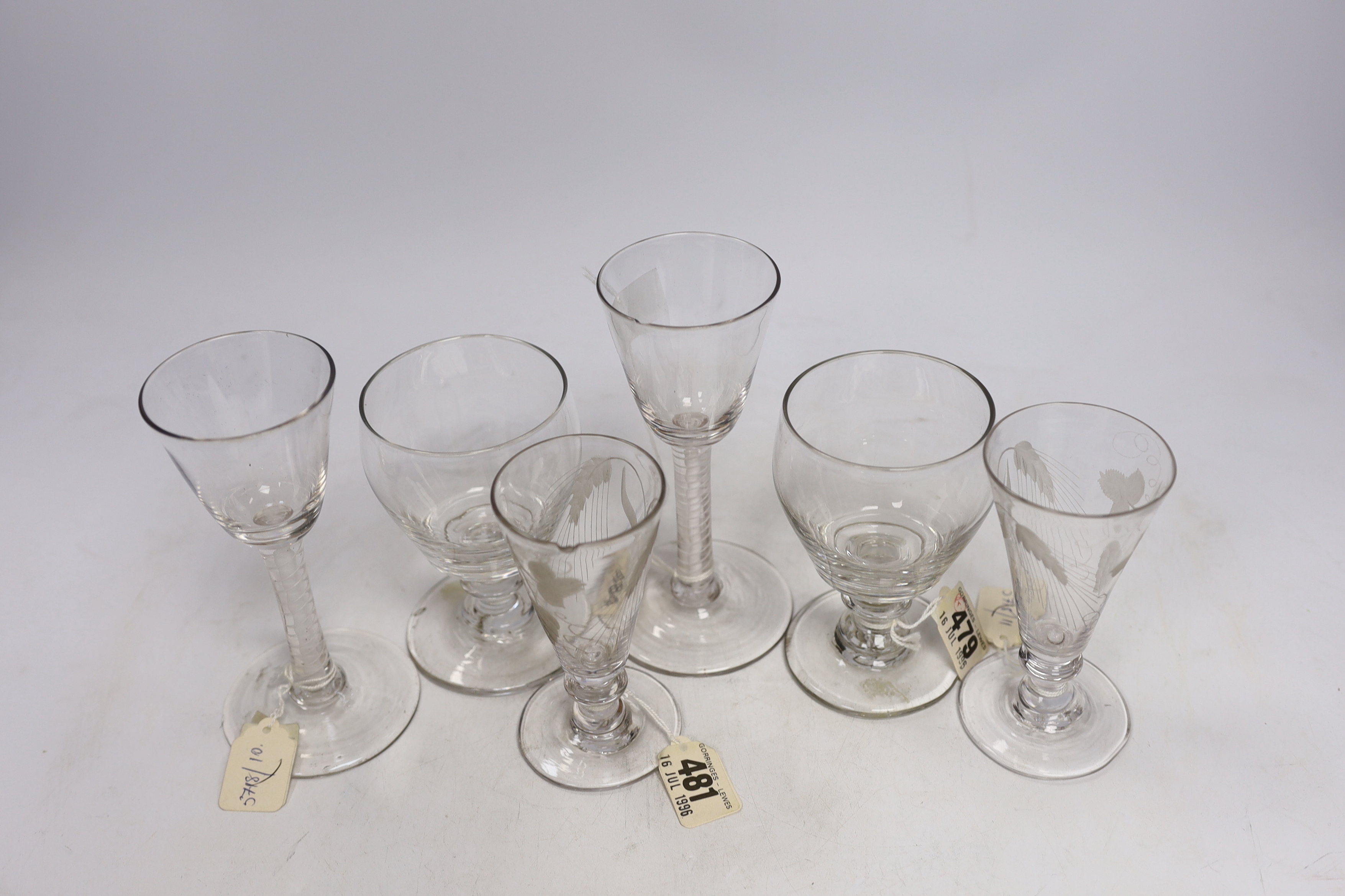 Two late 18th century DSOT Wine glasses, two dwarf ale glasses with engraved hops and barley, and knopped stems, two early 19th century drummers with knopped stems and rough pontils, tallest 16cm (6)